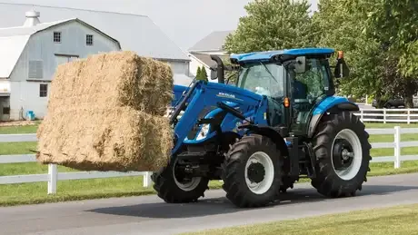 Rely on New Holland material handling equipment to spread, cut, level and move and material that stands in your way.